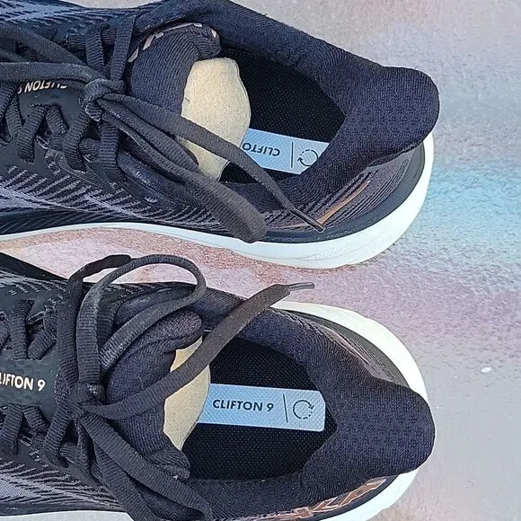 $145 HOKA CLIFTON 9 BLACK GOLD RUNNING TENNIS SHOES SZ 7 38 ALMOST NEW