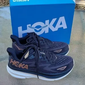 $145 HOKA CLIFTON 9 BLACK GOLD RUNNING TENNIS SHOES SZ 7 38 ALMOST NEW