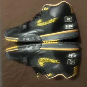 Black and Gold High-Top Athletic Shoes Air Trainer 1 College Football Pack Black