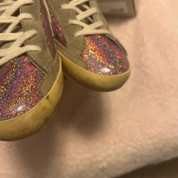 GOLDEN GOOSE SUPER STAR shoes.