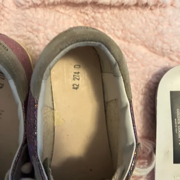 GOLDEN GOOSE SUPER STAR shoes.