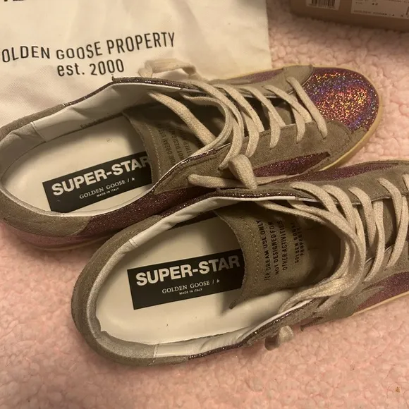 GOLDEN GOOSE SUPER STAR shoes.