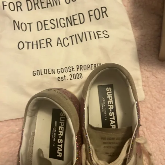 GOLDEN GOOSE SUPER STAR shoes.