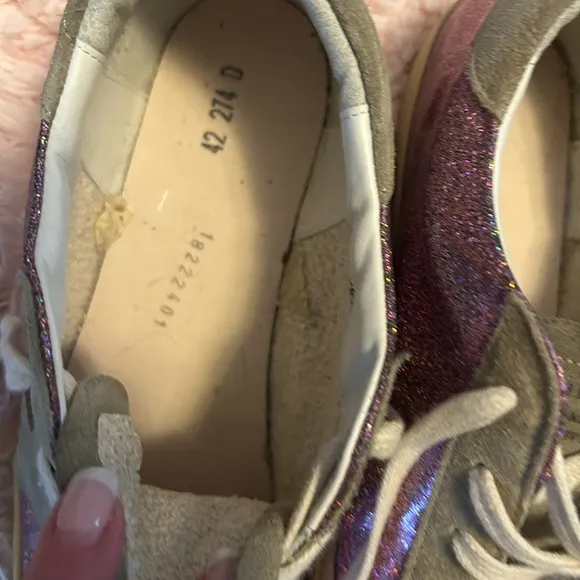 GOLDEN GOOSE SUPER STAR shoes.