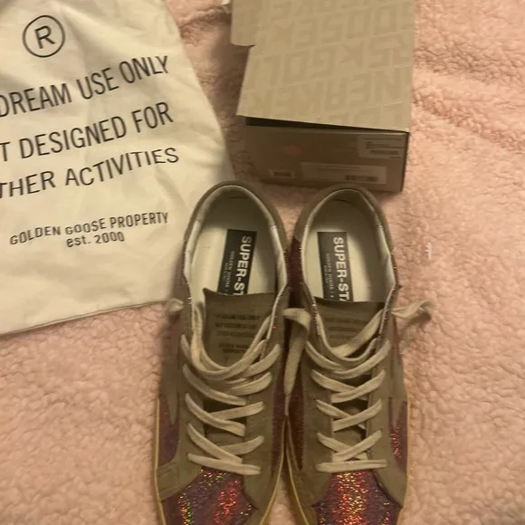 GOLDEN GOOSE SUPER STAR shoes.