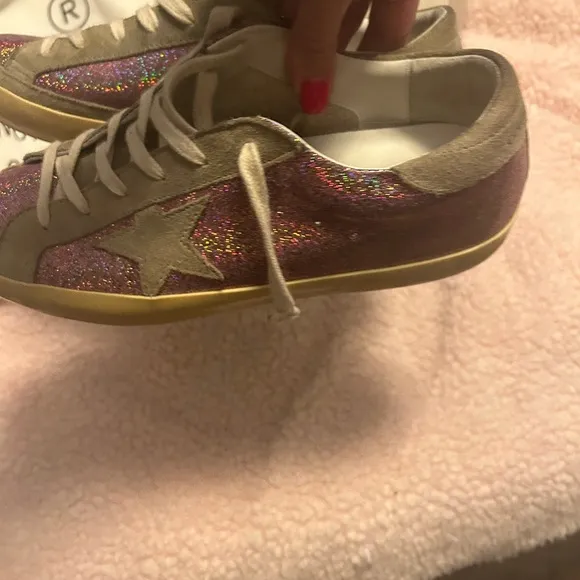GOLDEN GOOSE SUPER STAR shoes.