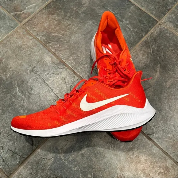 Nike Air Zoom Vomero sneakers, size 15, virtually no wear noted. Orange.