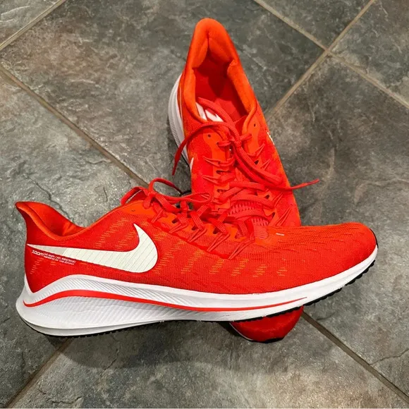 Nike Air Zoom Vomero sneakers, size 15, virtually no wear noted. Orange.
