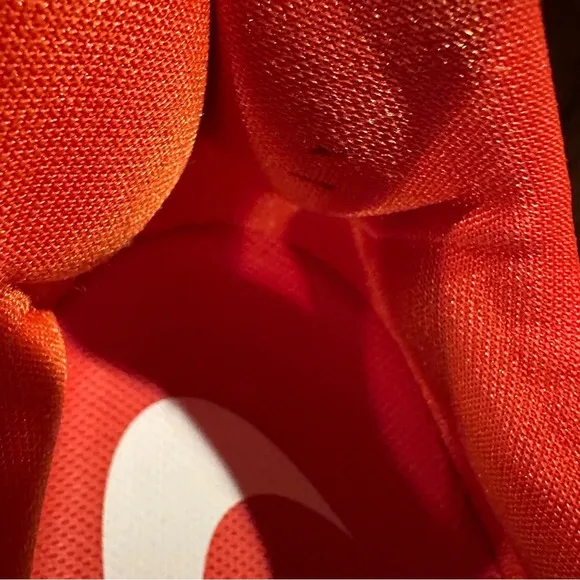 Nike Air Zoom Vomero sneakers, size 15, virtually no wear noted. Orange.