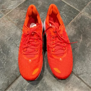 Nike Air Zoom Vomero sneakers, size 15, virtually no wear noted. Orange.