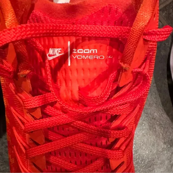Nike Air Zoom Vomero sneakers, size 15, virtually no wear noted. Orange.