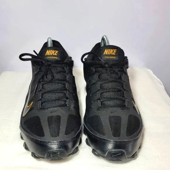 Nike Men's Size 10 Reax 8 Mesh Training shoes.