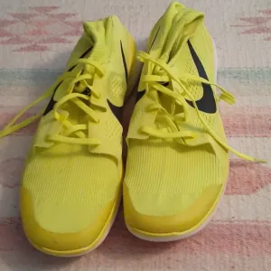 Nike Neon tennis shoes.