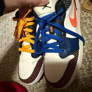 Nike Orange and Blue Sneakers Eye-Catching Design