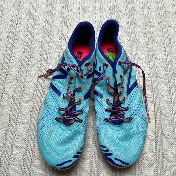 NWOT women’s New Balance Silent Hunter track shoes 9.5 Aqua purple animal print