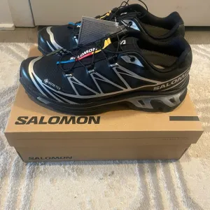 Salomon Black Athletic Shoes with Quick-Lace System