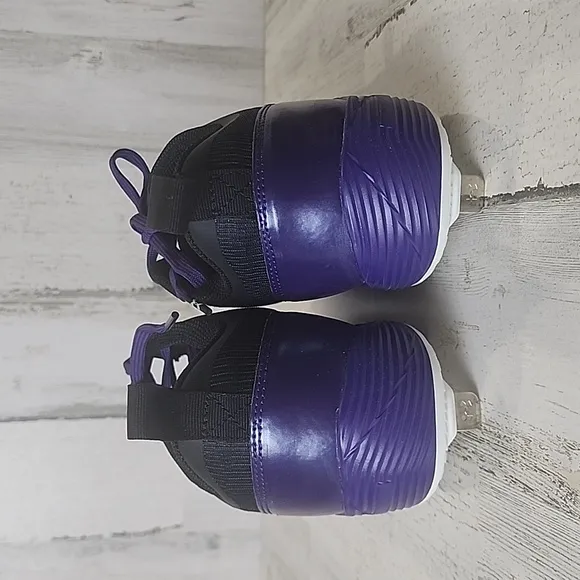 Under Armour UA team heater low purple black baseball cleats shoes Size 11 NEW