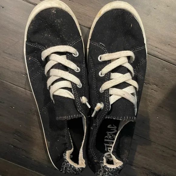 Very Used Tennis Shoes