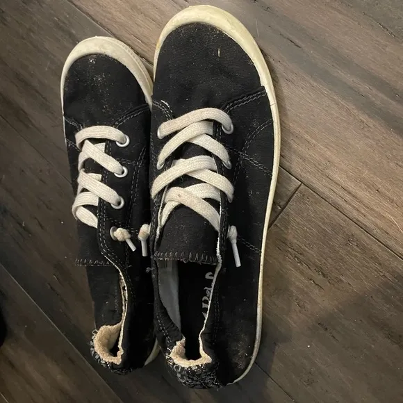 Very Used Tennis Shoes
