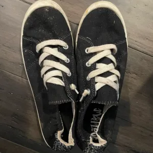Very Used Tennis Shoes